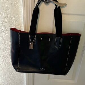 NWT Coach tote purse black pebble leather. Maroon lining inside